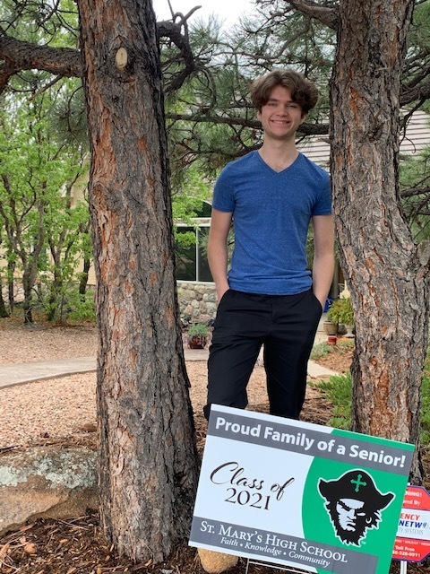 senior with sign