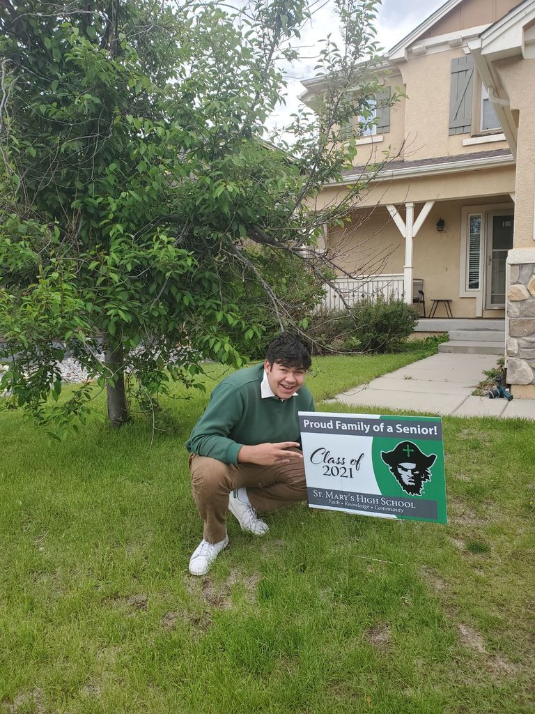 senior with sign