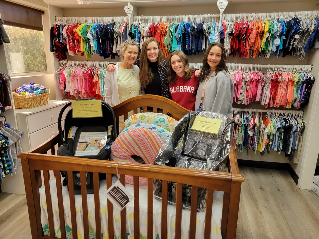 high school students with baby donation items