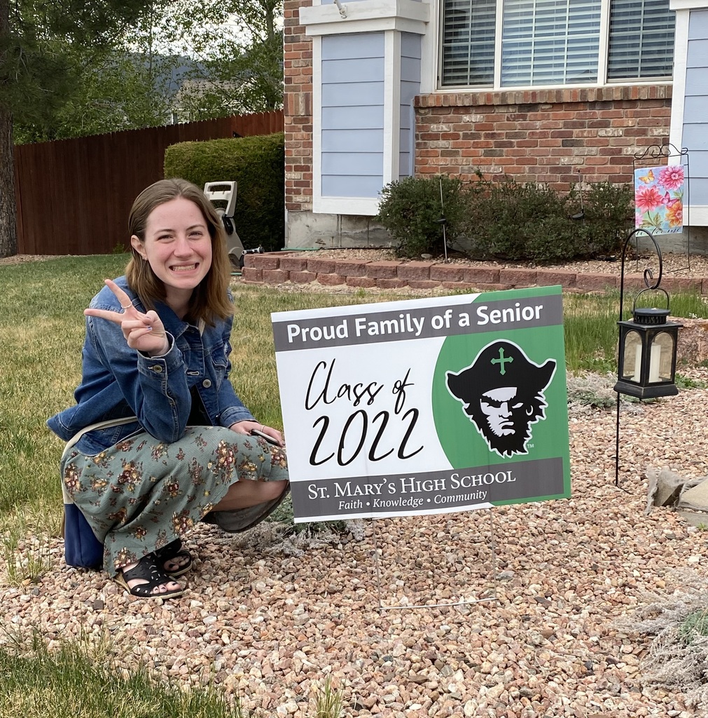teen with yard sign
