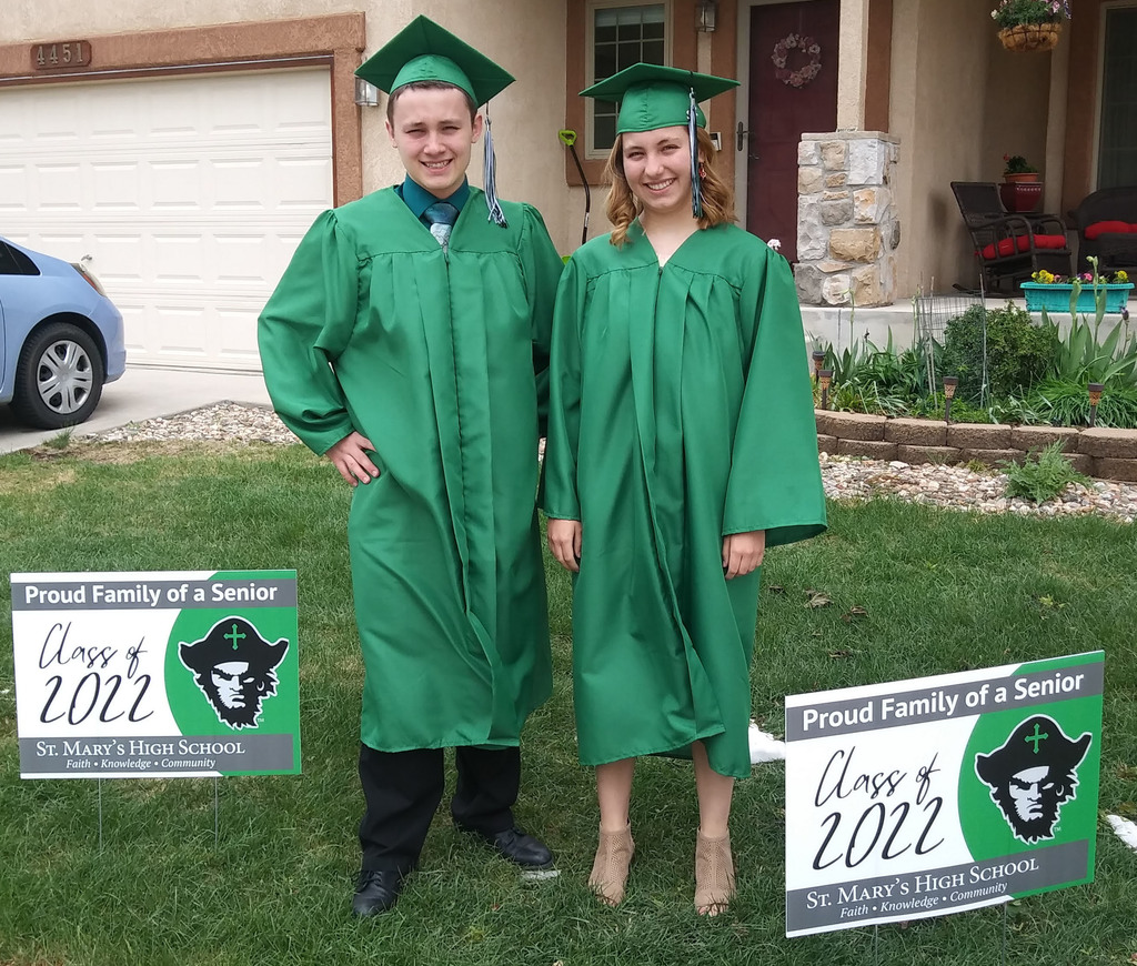 Twin Seniors with their yard signs